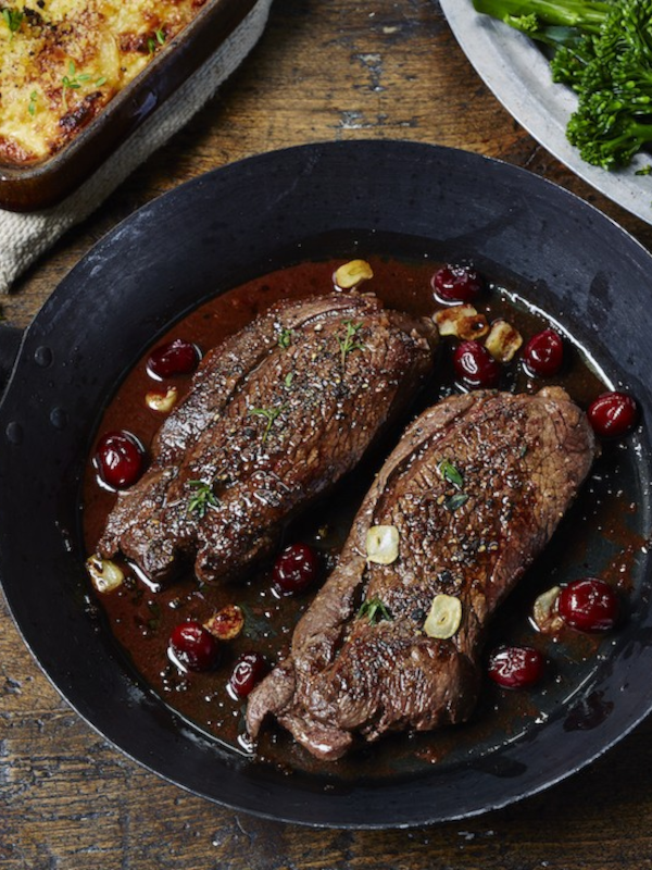 Venison steaks with red wine & cranberry sauce